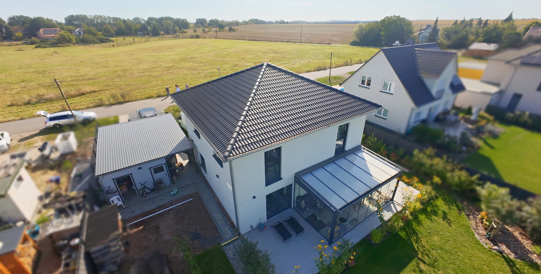 Haus mit überdachter Terrasse · Ansicht 3