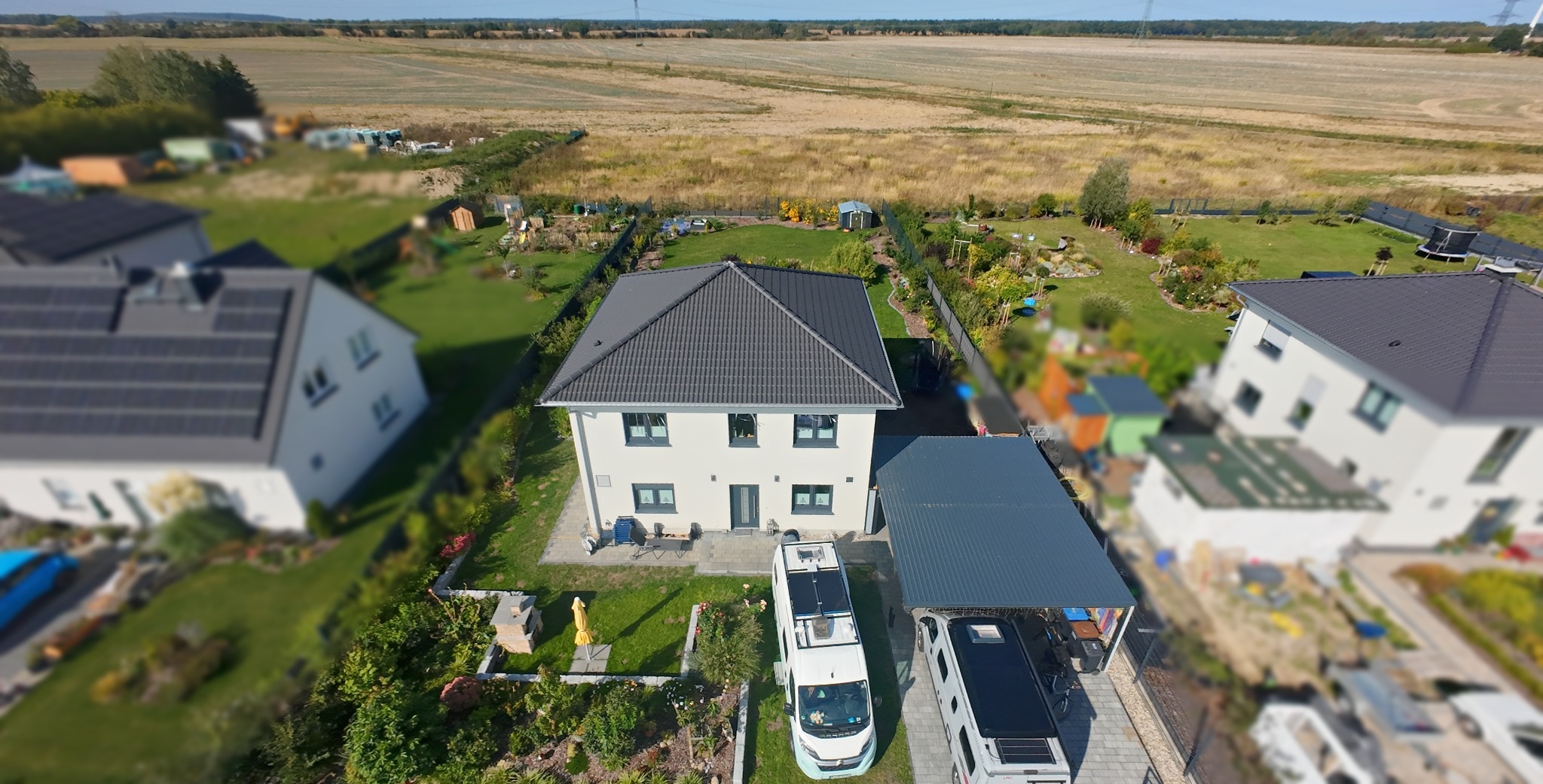 Haus mit überdachter Terrasse · Ansicht 4